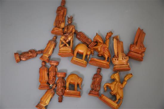 A rare 18th century white and brown walrus ivory Russian chess set, featuring Russians against Persians, in mahogany box,